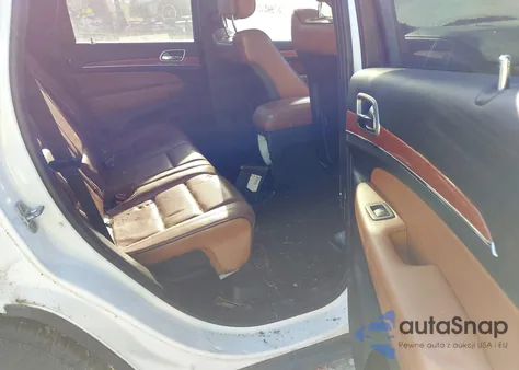 2013 Jeep Grand Cherokee Overland z USA, uszkodzony, nr VIN 1C4RJFCT7DC525316